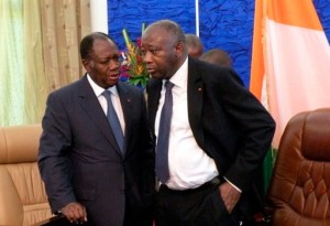 Laurent Gbagbo et Alassane Ouattara Alassane Ouattara (gauche), surnommé ADO, a un doctorat en économie et Laurent Koudou Gbagbo (droite) possède un doctorat en histoire.